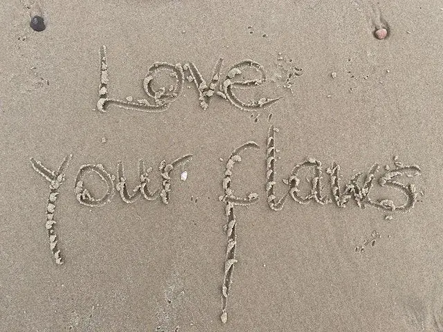 love your flaws drawn in sand