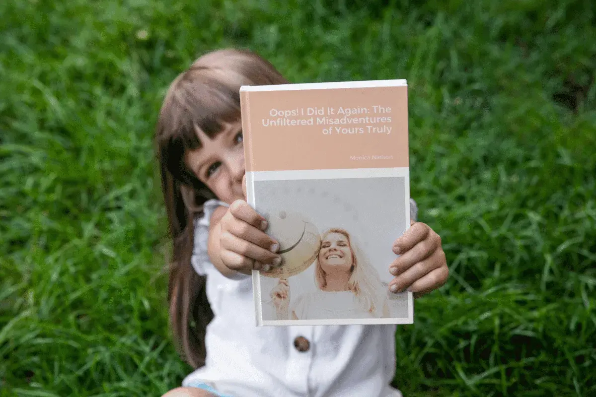 girl holding beautifl kindred tales memoir containing cherished life stories